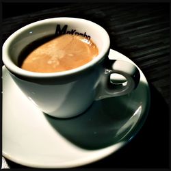 Close-up of coffee cup on table