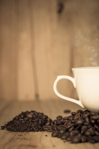 Close-up of coffee beans on table