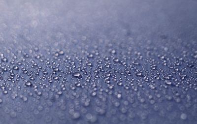 Full frame shot of wet window during rainy season