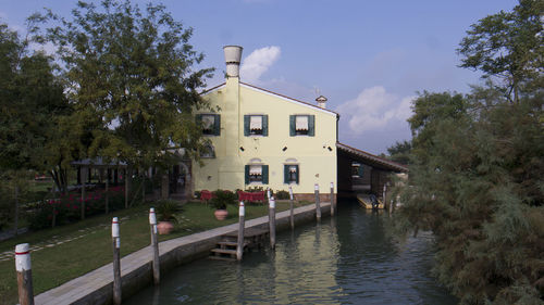 View of canal along buildings