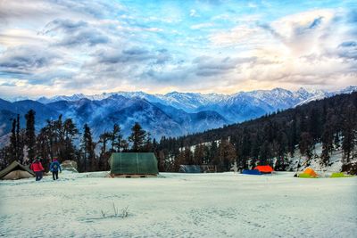 Scenic view of snowcapped mountains against sky