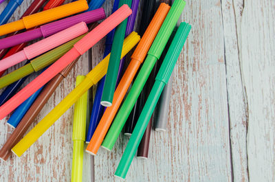 High angle view of multi colored pencils on table