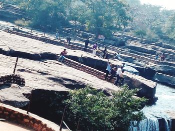 High angle view of people by river