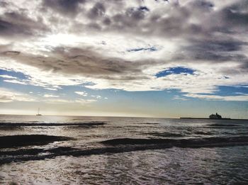 Scenic view of sea against sky during sunset