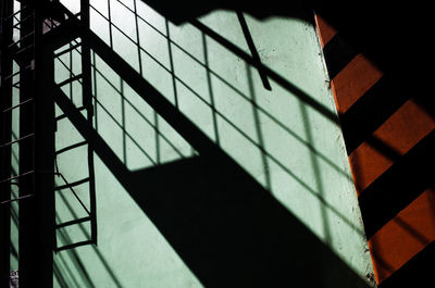 Reflection of stair shadows on building exterior