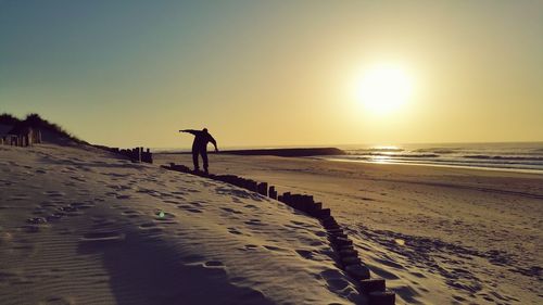 Scenic view of sea at sunset