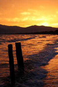 Scenic view of sea against sky during sunset