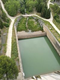 High angle view of dam by river