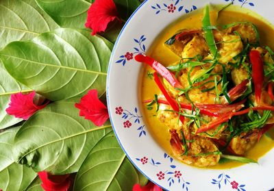 Directly above shot of prawns curry served in bowl