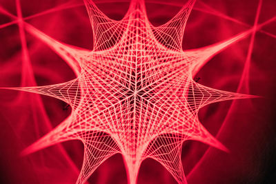 Full frame shot of illuminated red umbrella