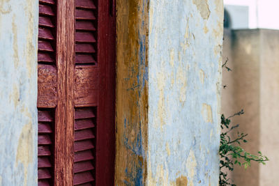 Close-up of old wooden door of building