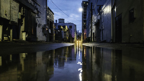 Reflection of illuminated buildings in water