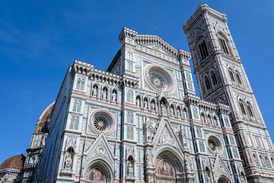 Low angle view of cathedral against blue sky