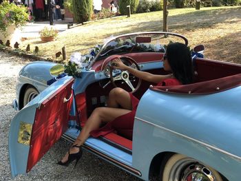 Woman sitting in car