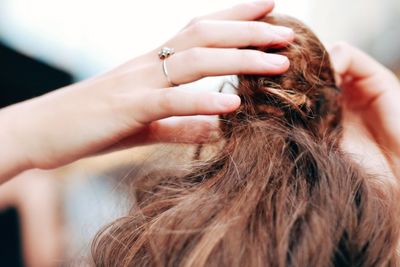 Cropped image of woman with hair bun