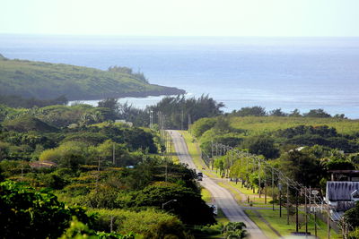 High angle view of road by sea against sky