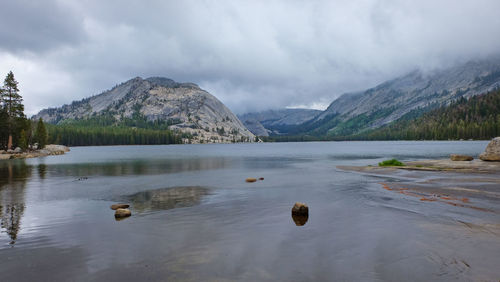 Scenic view of lake and mountains against sky