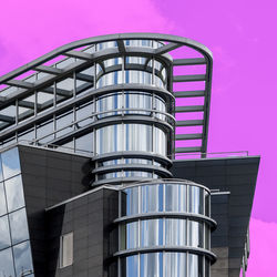 Low angle view of modern building against clear sky