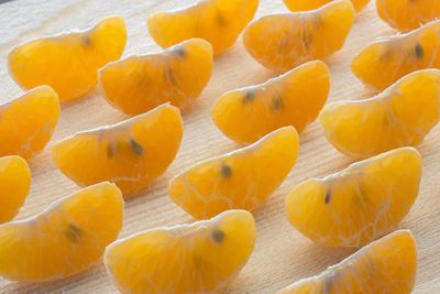 Close-up of orange on wooden table