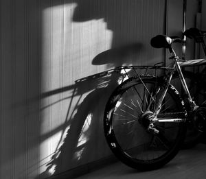 High angle view of bicycle wheel against wall