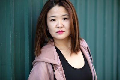 Portrait of young woman looking away