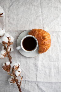 High angle view of coffee cup on table