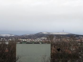 Buildings in city against sky