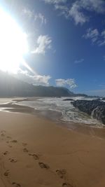 Scenic view of beach against sky