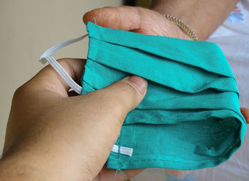 Close-up of woman holding hands