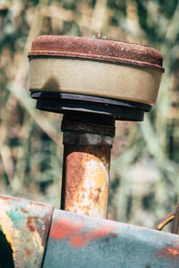 Close-up of old rusty machine part