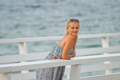Rear view of woman looking at sea
