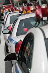 Close-up of car on road