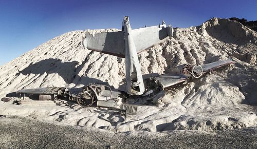 Airplane crash in nevada desert on sunny day