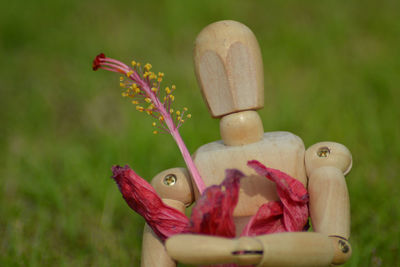 Close-up of stuffed toy on wood