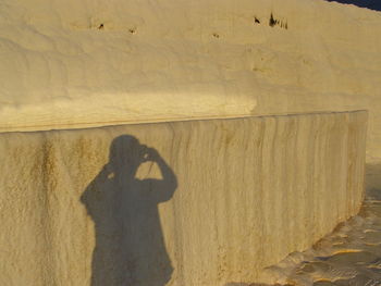 Shadow of person on wall