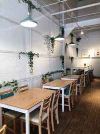 Empty chairs and table in restaurant