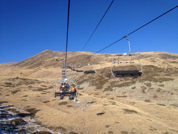 Overhead cable car over mountain range