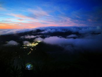 Low angle view of clouds in sky at sunset