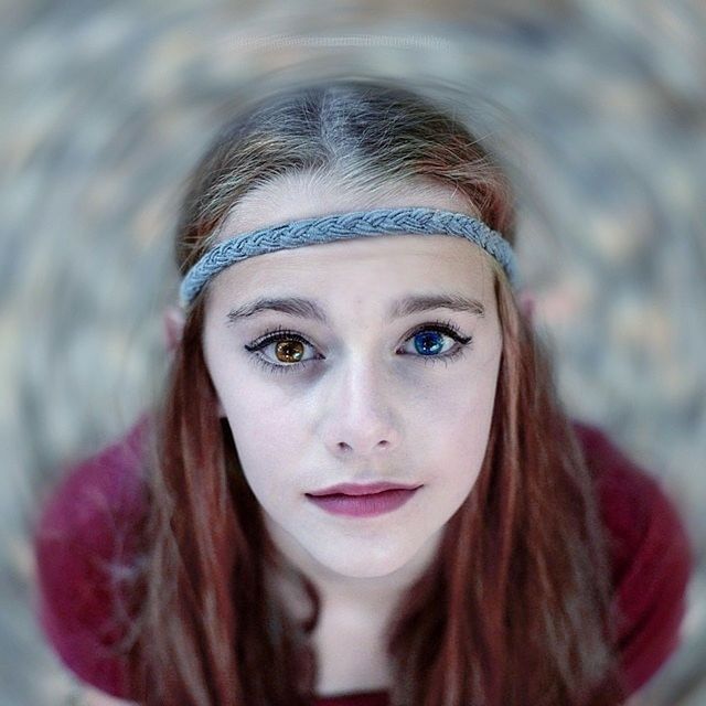 looking at camera, portrait, headshot, person, close-up, lifestyles, young adult, leisure activity, front view, focus on foreground, smiling, human face, young women, head and shoulders, indoors, brown hair, long hair