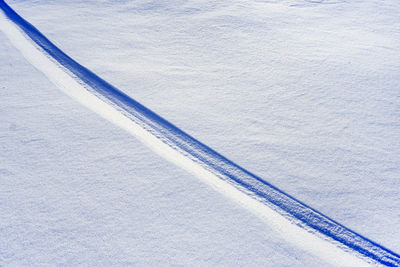 High angle view of snow covered field