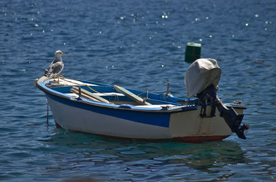 Boat moored in sea