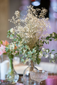 Close-up of flower vase on table