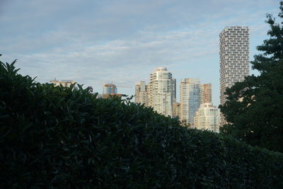 Buildings in city against sky