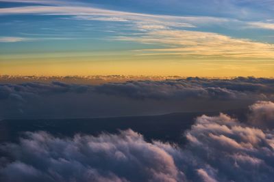 Low angle view of dramatic sky during sunset