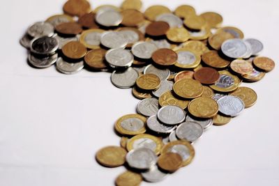 High angle view of coins