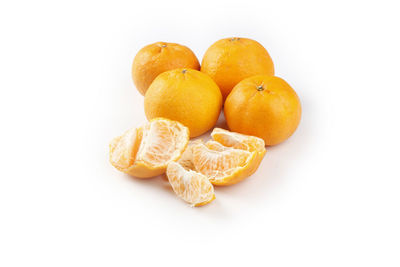 Close-up of fruits against white background