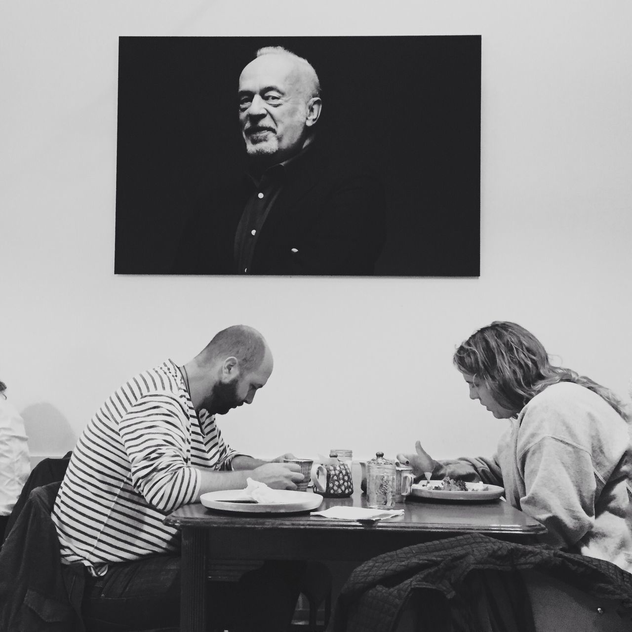 men, young men, two people, young adult, arts culture and entertainment, sitting, indoors, males, shaved head, happiness, only men, adult, people, senior men, adults only, day