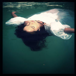 Woman standing in water