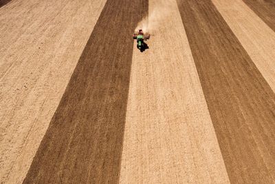 High angle view of man skateboarding on road