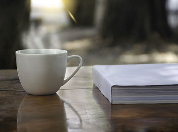 Close-up of coffee cup on table